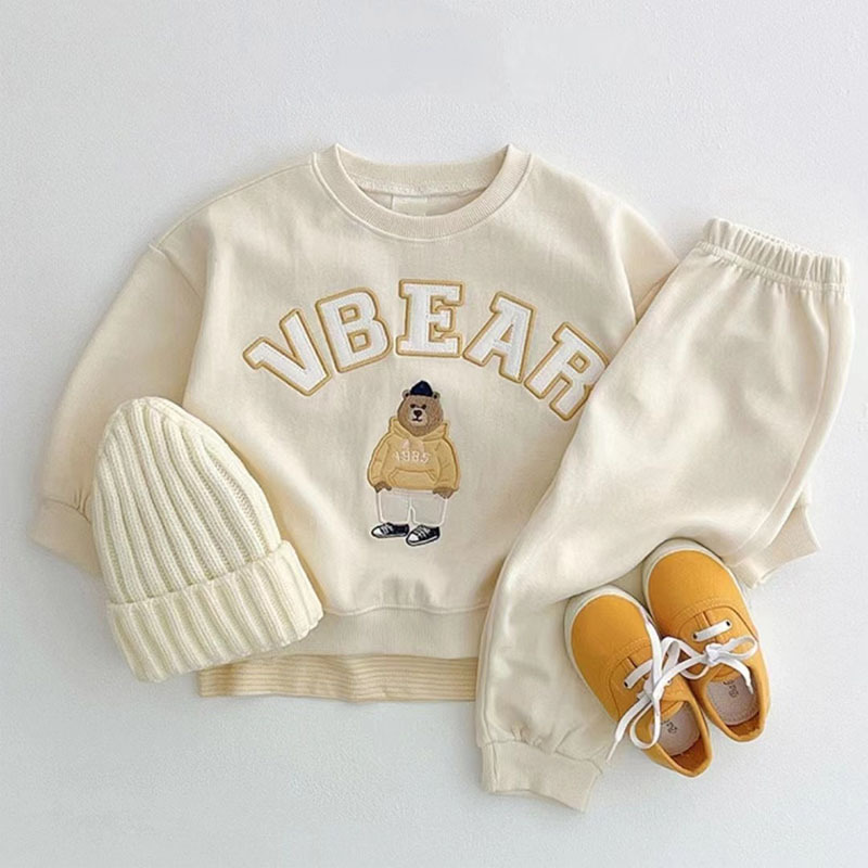 Korean version of the spring and autumn children's sports fashion suit cartoon bear letter printing long sleeve sweater + pants two-piece suit