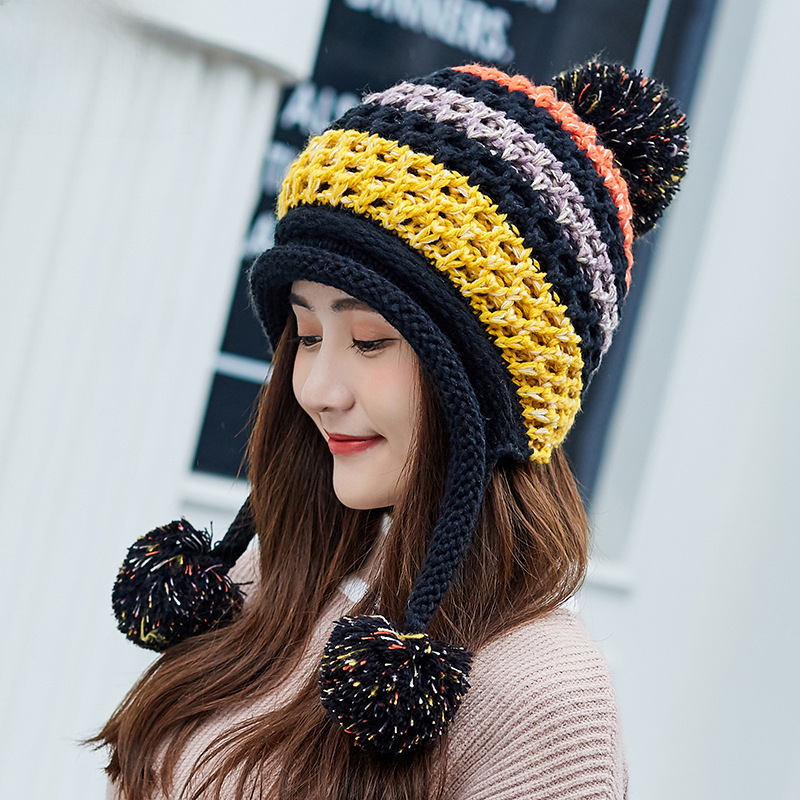 Autumn and winter wool hat women's Korean version of the color matching plus fluff ball knitted hat three hair ball ear protection warm hat