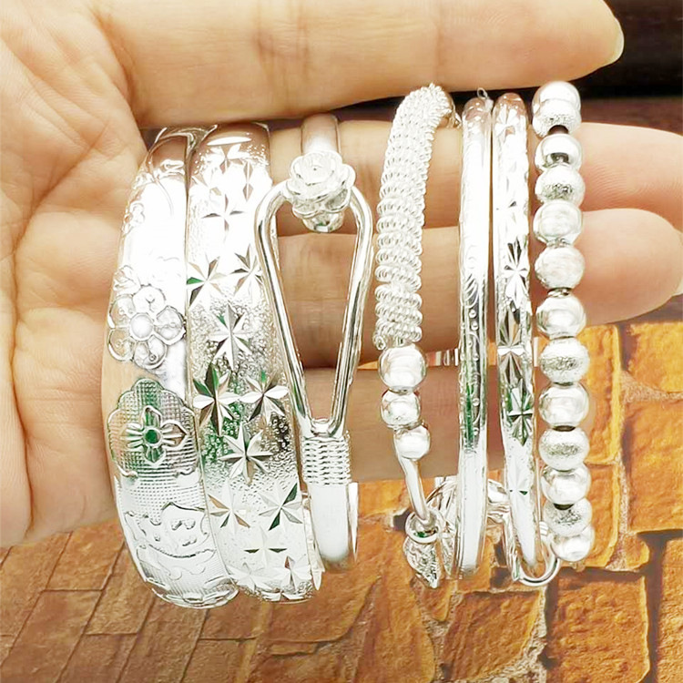 Ethnic style Miao silver starry hoop mantra Fu bracelet female 20-34560 years old 10 yuan shop imitation silver plated bracelet