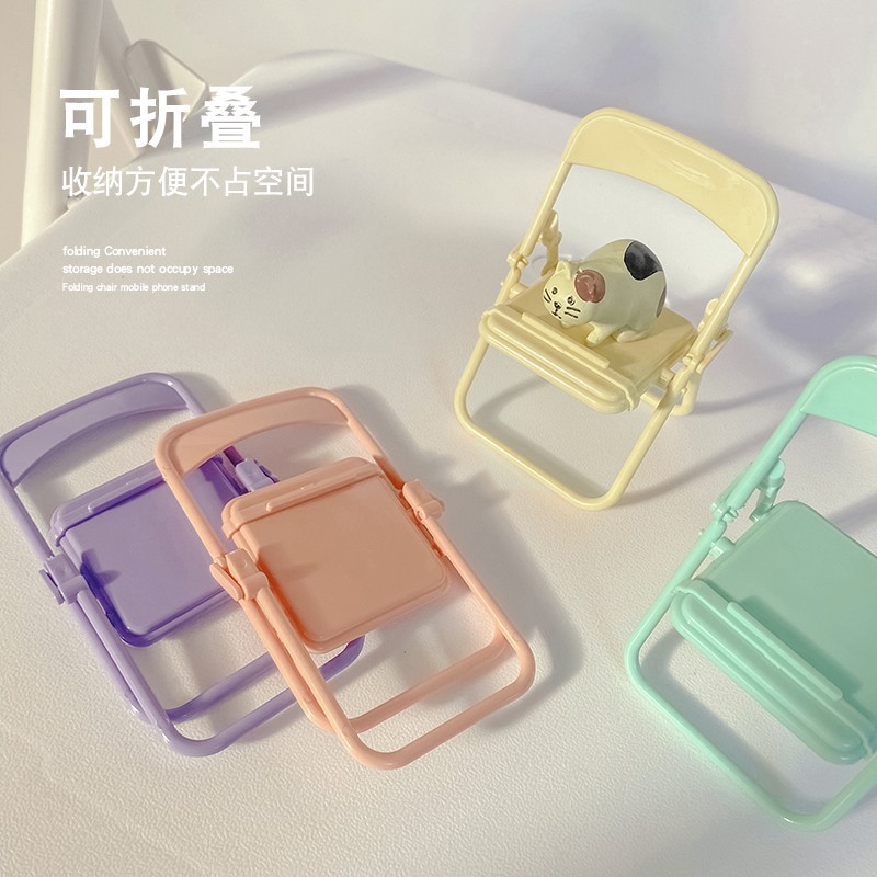 Creative small chair desktop lazy person chasing drama mobile phone small bracket cartoon stool bracket Mini small ornament base