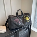 涂鸦个性旅行包潮洋气收纳包出差户外行李袋休闲大容量手提斜挎包